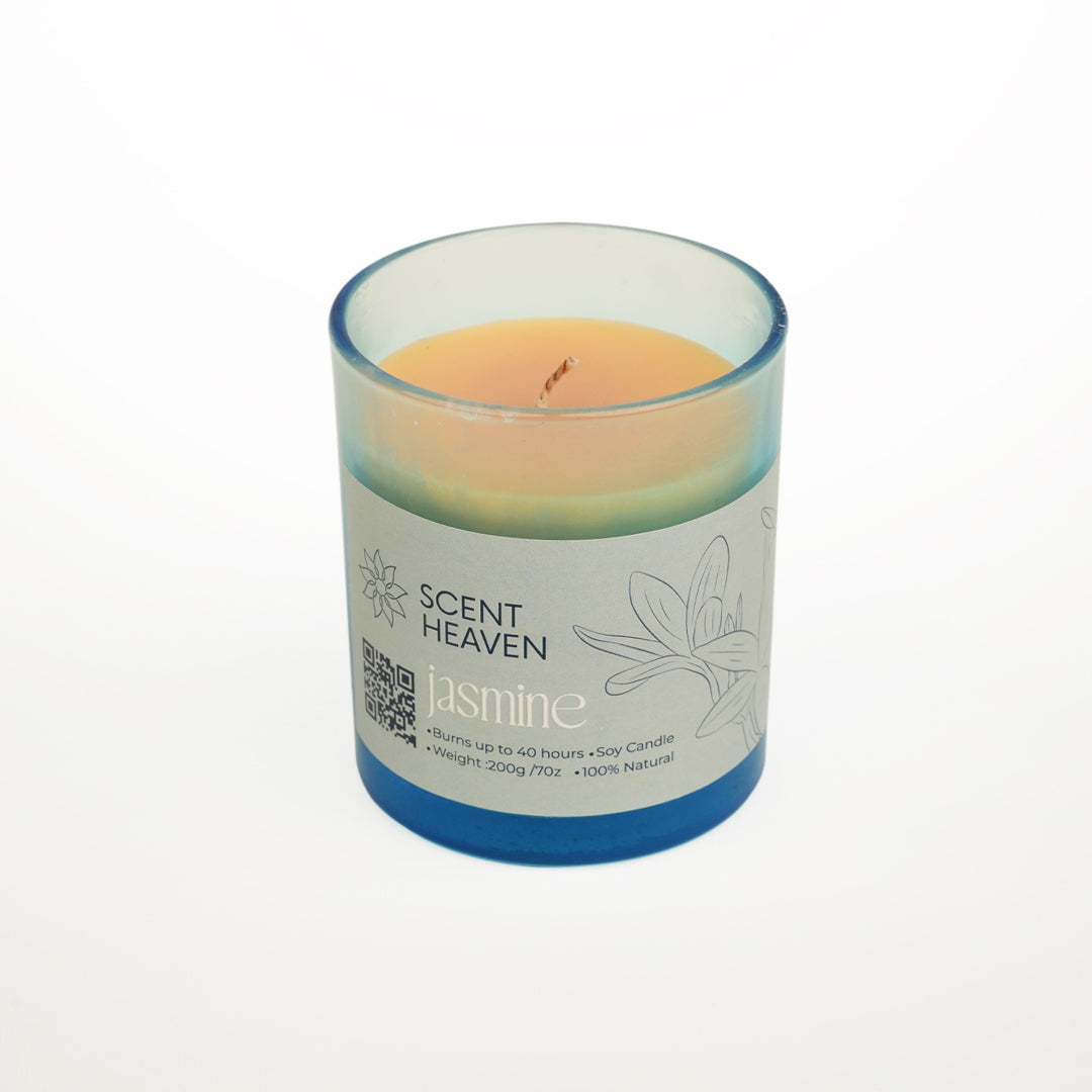 Candle with 'Scent Heaven' label on a white background