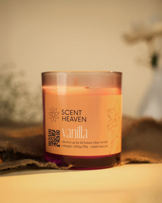 Vanilla candle with 'Scent Heaven' label on a blurred background